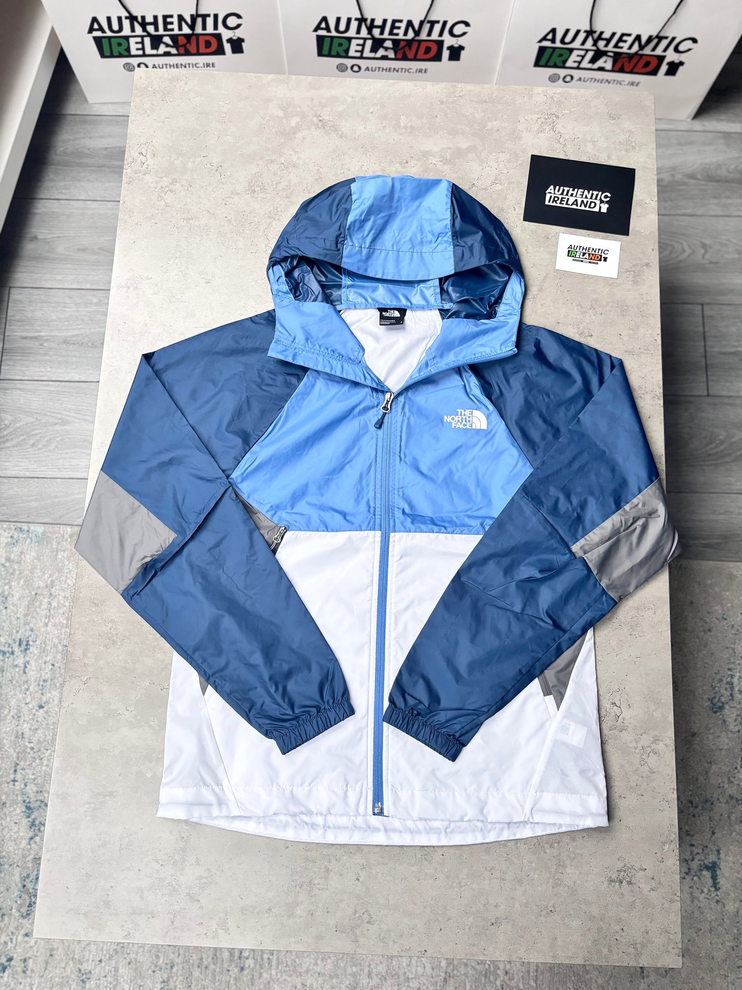 THE NORTH FACE WINDBREAKER JACKET - BLUE/NAVY/GREY/WHITE
